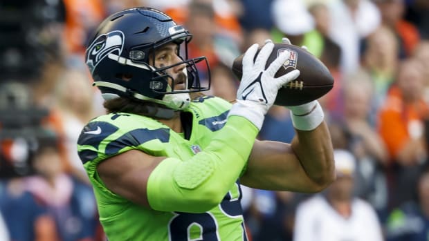 Seattle Seahawks tight end Colby Parkinson (84) catches a touchdown pass against the Denver Broncos during the second quarter at Lumen Field.